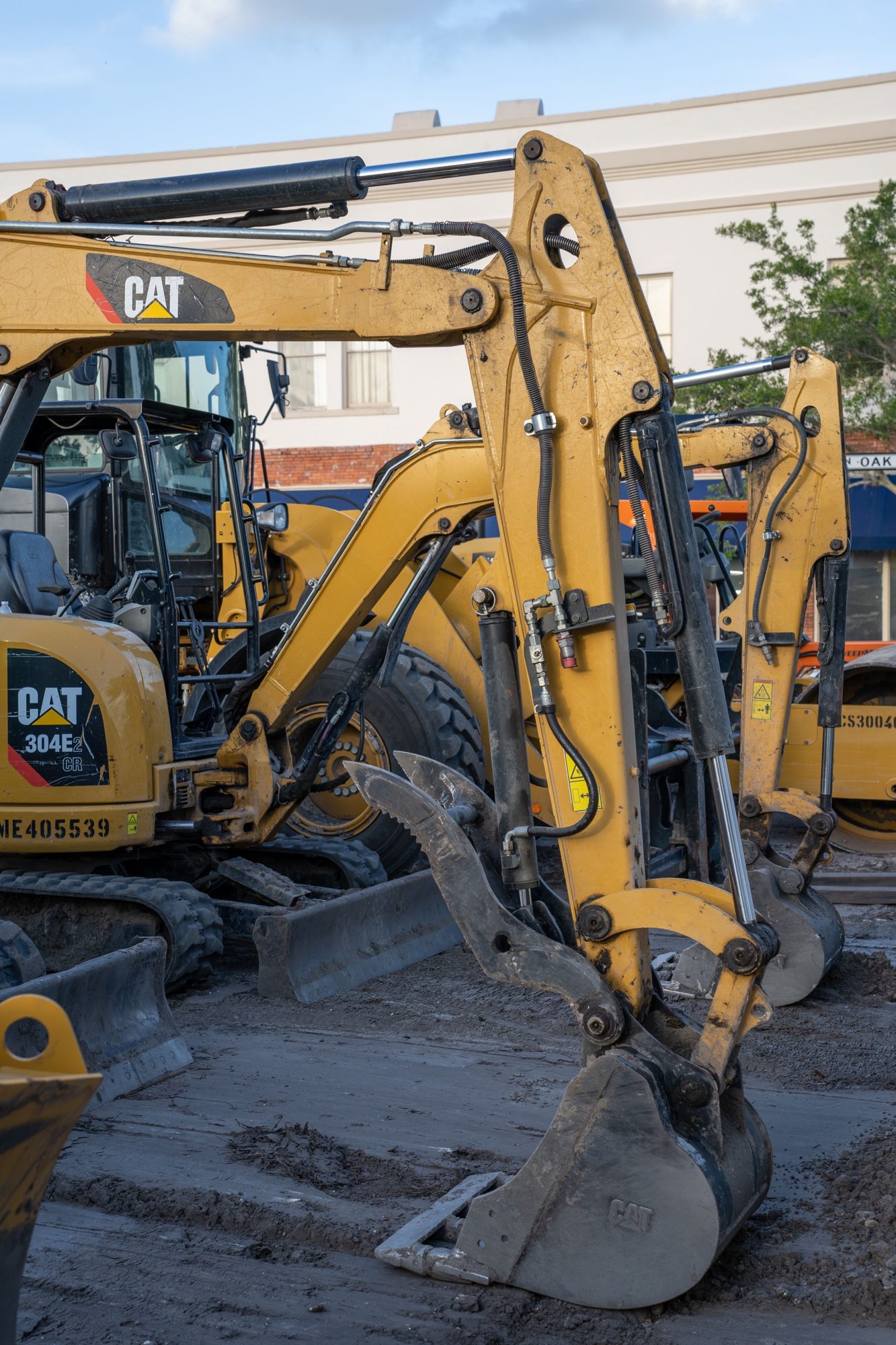 Excavator boom and bucket on a job site